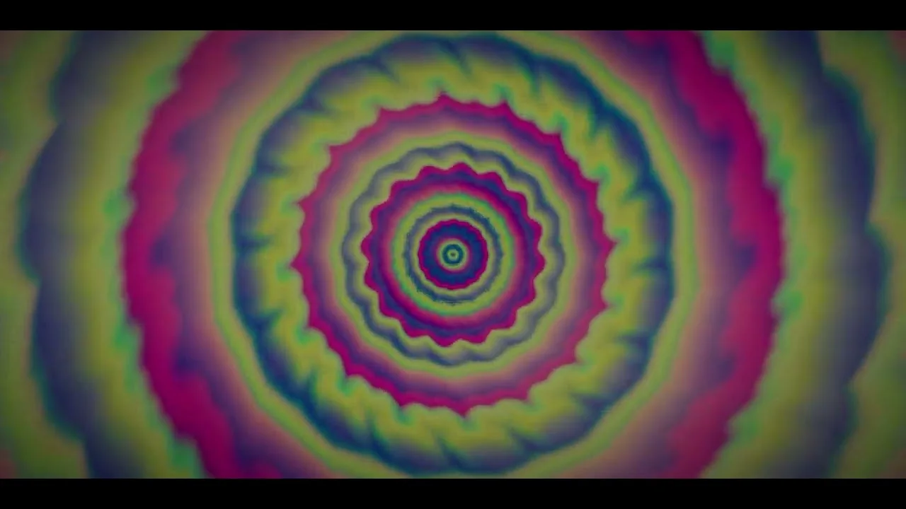 Still from BaRRyT: concentric rings of yellow, magenta and blue rippling out from the centre